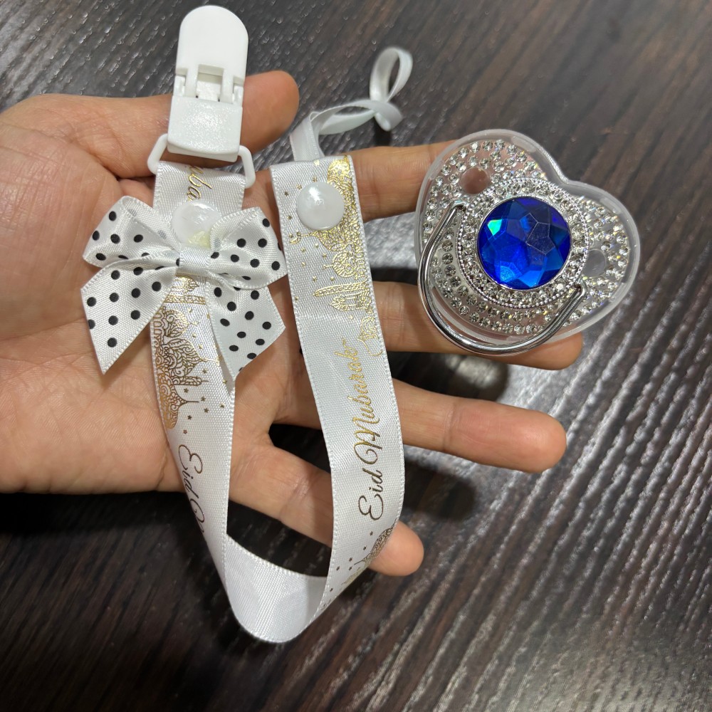 مصاصة ذهبية لامعة للأطفال وحام - مراجعة Baby Clothing Gift Set وسعره
