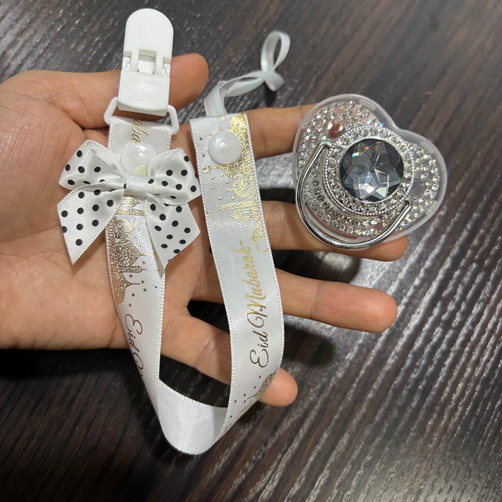مصاصة ذهبية لامعة للأطفال وحام - مراجعة Baby Clothing Gift Set وسعره