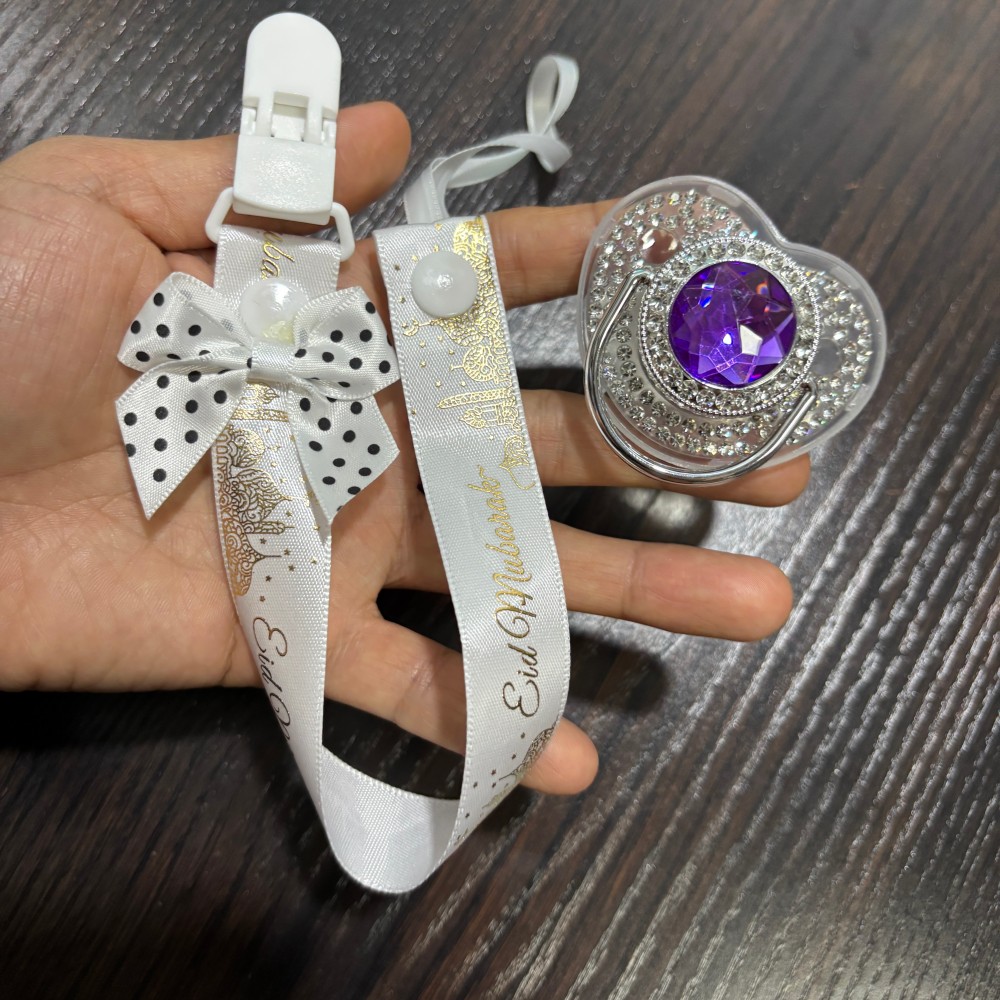 مصاصة ذهبية لامعة للأطفال وحام - مراجعة Baby Clothing Gift Set وسعره
