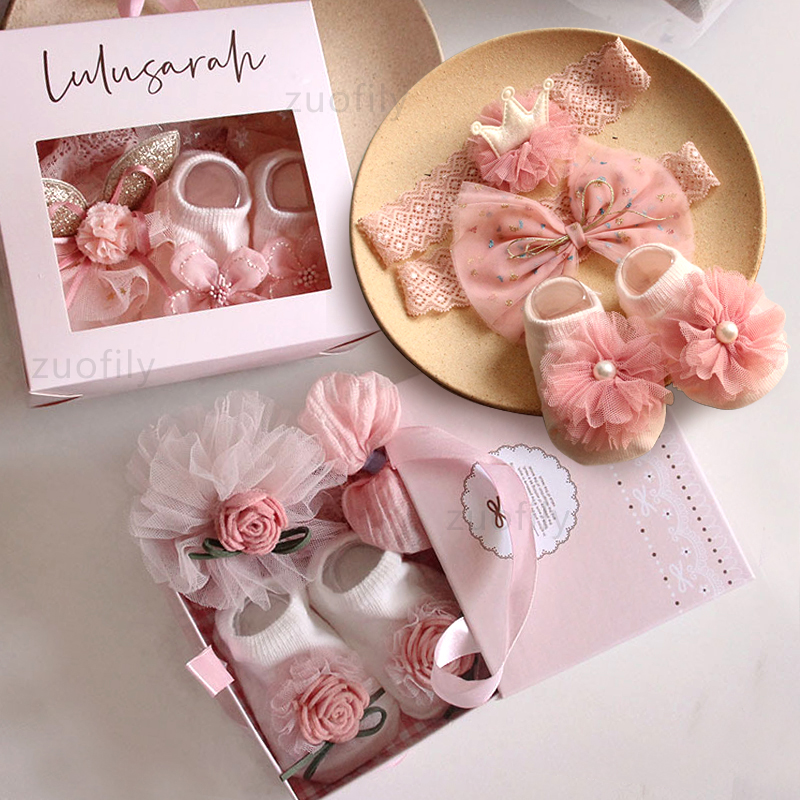 مجموعة من عصابة رأس وجوارب للف - مراجعة Baby Clothing Gift Set وسعره